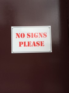 "No Signs Please" Sign