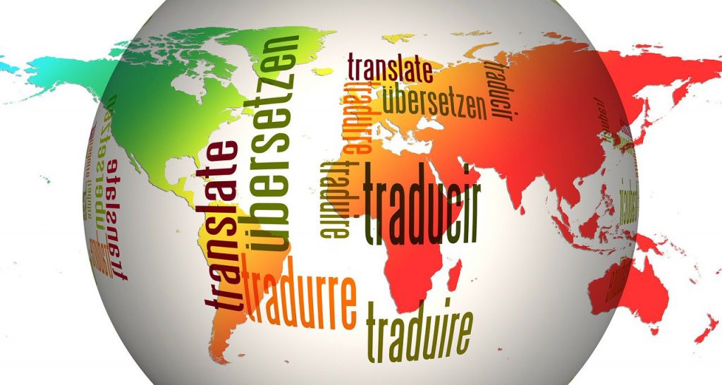 Globe with the word for "translate" written on different countries in the languages of those countries. Credit: Gerd Altmann via Pixabay.